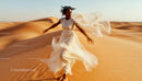 Woman in Flowing Dress Running Through Desert Dunes