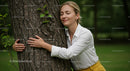 Woman Embracing Nature with a Tree Hug in Green Park