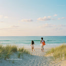 Family Running Towards a Serene Beach on a Sunny Day