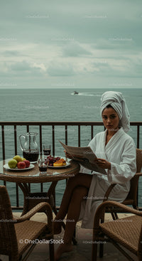 Woman Enjoying a Relaxing Breakfast by the Sea