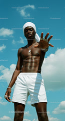 Confident Man Posing Under a Clear Blue Sky