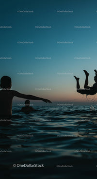Silhouetted Friends Enjoying a Sunset Swim Adventure