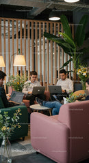 Modern Office with Indoor Plants and Collaborative Work