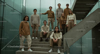 Group of Young People in Neutral Toned Fashion on Stairs
