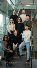 Diverse Business Team on Modern Office Staircase