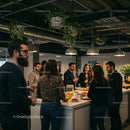 Casual Office Gathering with Modern Interior and Greenery