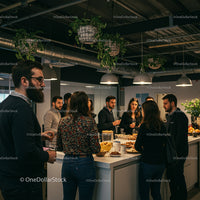 Casual Office Gathering with Modern Interior and Greenery