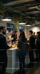 Casual Office Gathering with Colleagues and Snacks