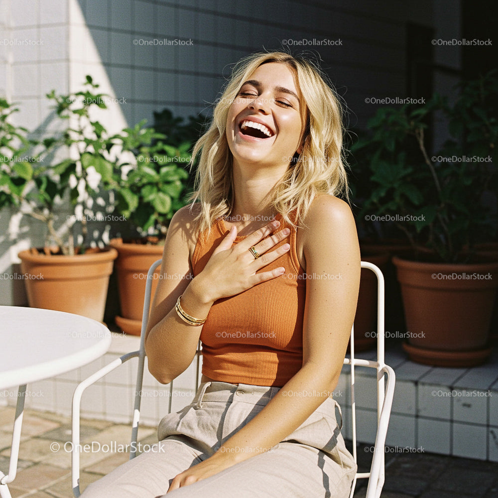 Joyful Woman Laughing Outdoors on a Sunny Day
