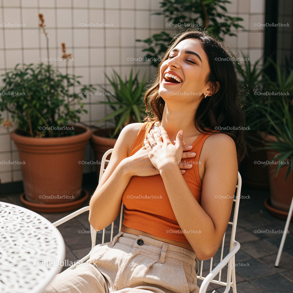 Joyful Woman Laughing in a Sunny Garden with Potted Plants
