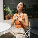 Joyful Woman Relaxing in Outdoor Urban Garden