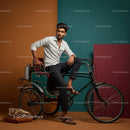 Stylish Man Posing on Modern Rickshaw in Studio Setting