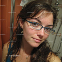 Casual Portrait of a Young Woman Wearing Glasses