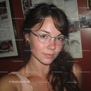Confident Young Woman in Glasses with Brunette Hair