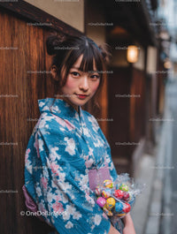 Young Woman in Floral Kimono Holding Colorful Candies