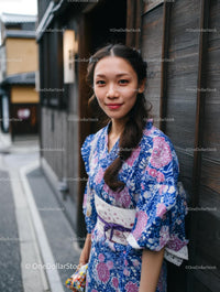 Woman in Floral Kimono on Traditional Japanese Street