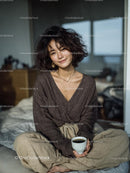 Relaxed Woman Enjoying Morning Coffee at Home