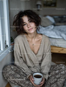 Woman Relaxing with Coffee in Cozy Casual Outfit
