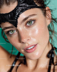Close-Up of Woman with Freckles and Black Mask