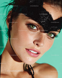 Vibrant Portrait of Woman with Mask and Green Eyes