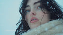 Woman with Snowflakes on Face in Winter Scene
