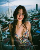Smiling Woman in Colorful Dress on Urban Rooftop at Sunset