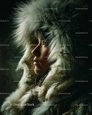 Portrait of a Person in a Fur Hat Against Dark Background