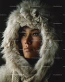 Warm Fur Hooded Winter Portrait with Introspective Gaze