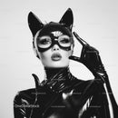 Glamorous Woman in Cat Costume with Bold Makeup