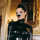 Fashionable Woman in Black Latex Outfit with Mask