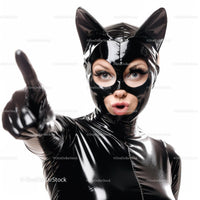 Woman in Black Cat Cosplay Costume with Dramatic Pose