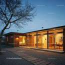 Modern Home with Warm Lighting During Twilight