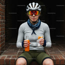 Female Cyclist Relaxing with Snack and Drink