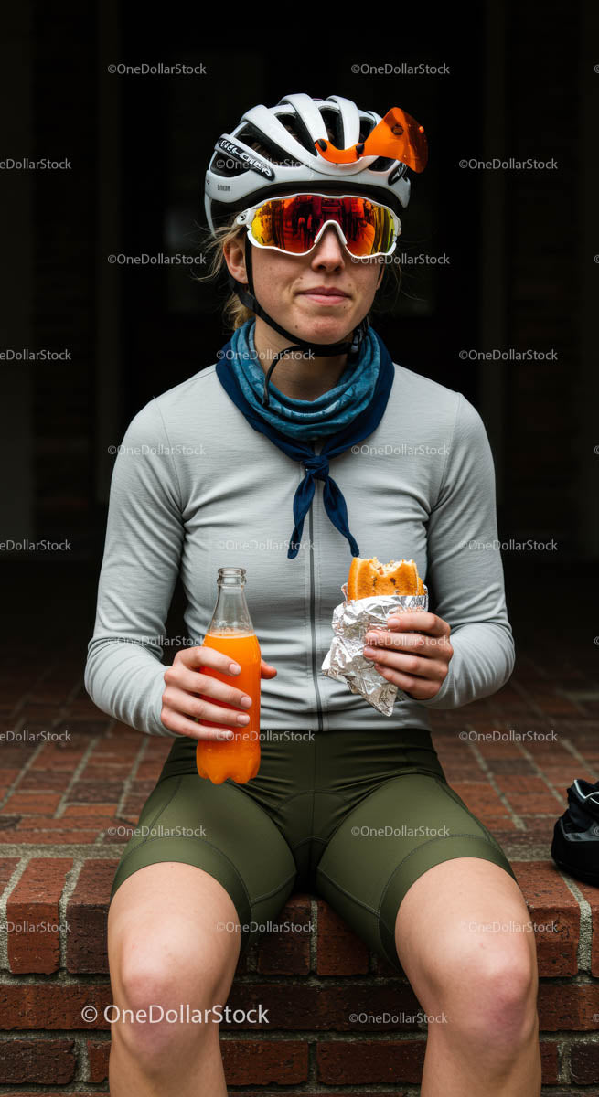 Cyclist Enjoying Snacks During Outdoor Break