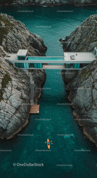 Modern Bridge House Over Turquoise Waters with Kayaker