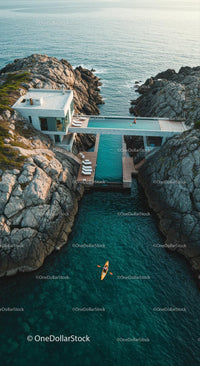 Luxury Cliffside Home with Kayakers on Turquoise Waters