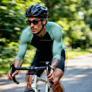 Focused Cyclist Riding Through Lush Green Park