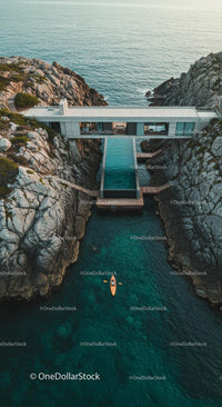Luxury Cliffside Home with Kayakers on Turquoise Waters