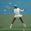 Dynamic Female Tennis Player in Action on Court