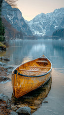 Yellow Canoe on Tranquil Mountain Lake with Snowy Peaks