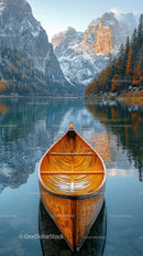 Tranquil Mountain Lake with Wooden Canoe and Autumn Colors