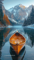 Wooden Canoe on Tranquil Mountain Lake at Dawn