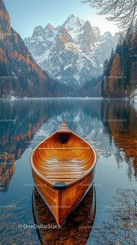 Wooden Boat on a Serene Lake with Snowy Mountain Backdrop