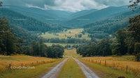 Scenic Road Through Lush Green Hills and Majestic Mountains