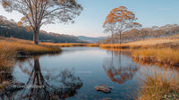 Peaceful Lake Surrounded by Autumn Trees at Golden Hour