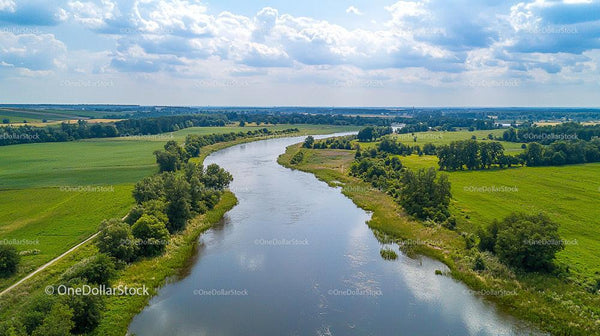 Scenic Aerial View of a Serene River and Countryside