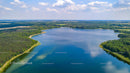 Aerial View of Tranquil Lake and Lush Forest Landscape