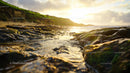 Sunlit Coastal Landscape with Rocky Shoreline at Sunset