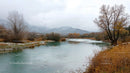 Tranquil River Scene in Autumnal Countryside
