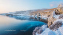 Snowy Cliffs and Tranquil Winter Lake Scenery